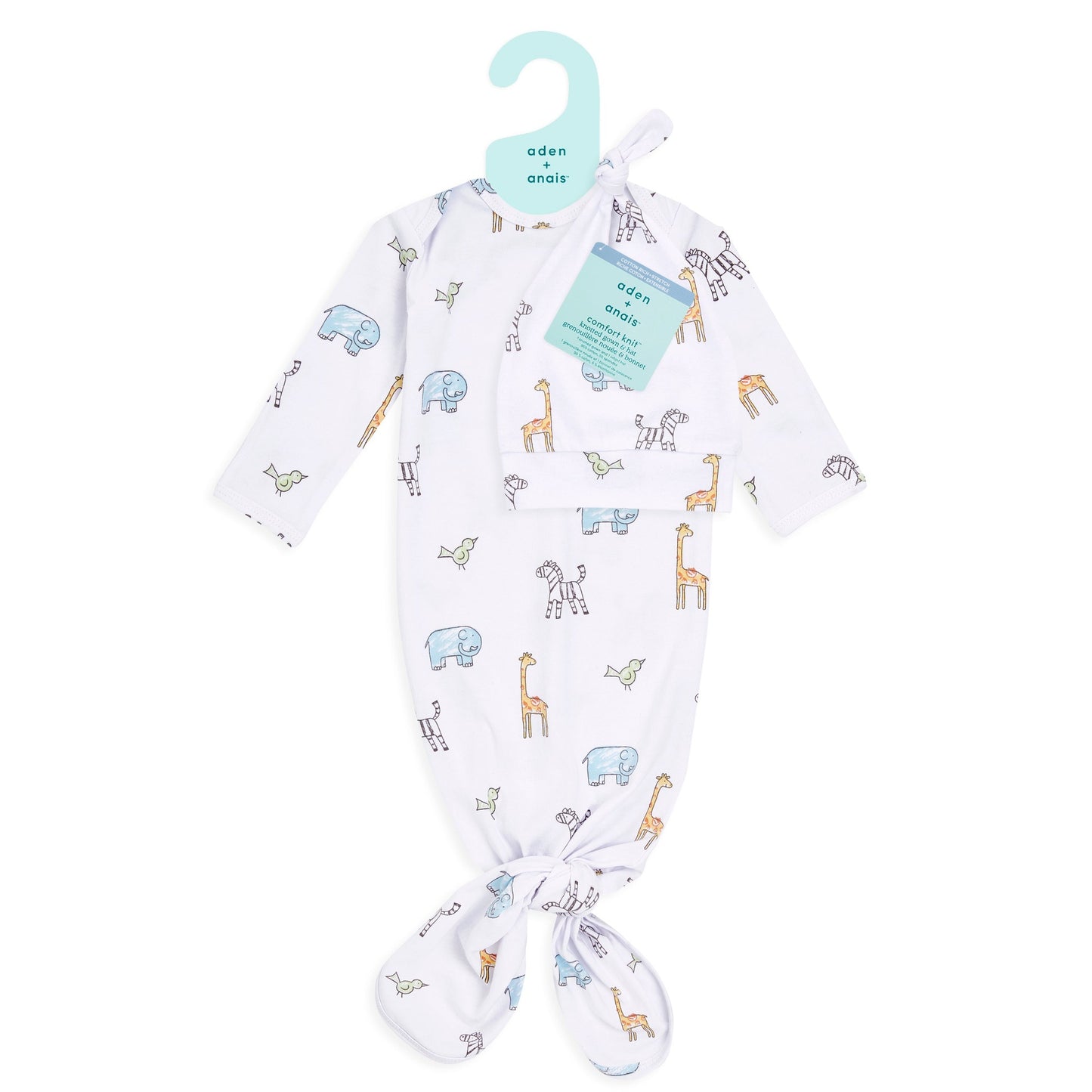 Balto smėlinuko ir kepurėlės komplektas su gyvūnėliais: žirafomis, drambliukais, zebriukais ir paukščiukais baltame fone